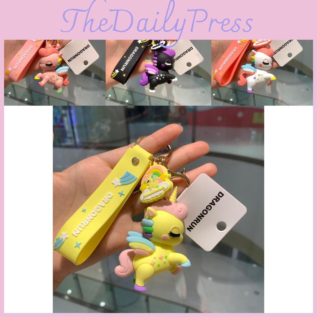 Bedårande enhörningsnyckelring tecknad stil söt väskberlock för par i rosa metall