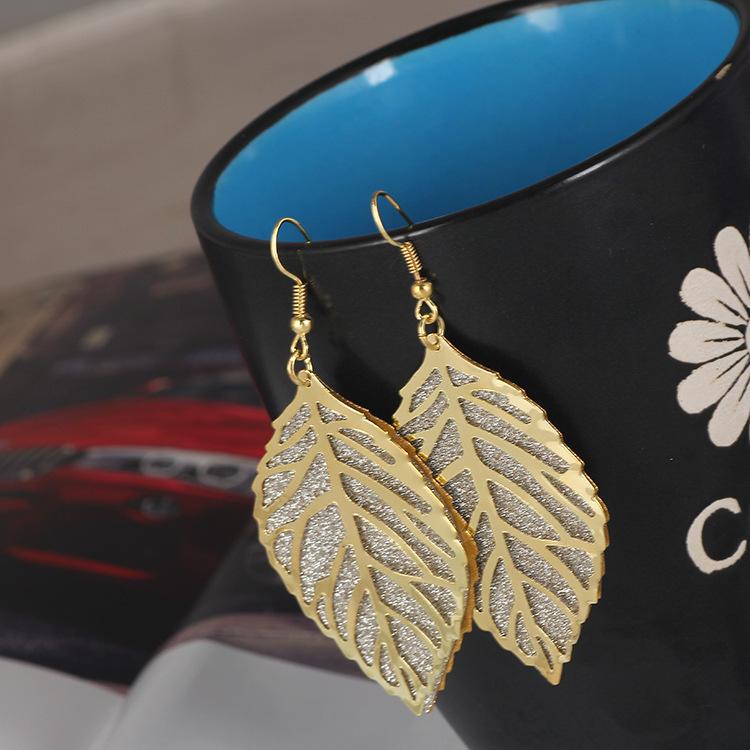 Frosted Geometric Leaf Tassel Earrings - Creative Hollow Round Design