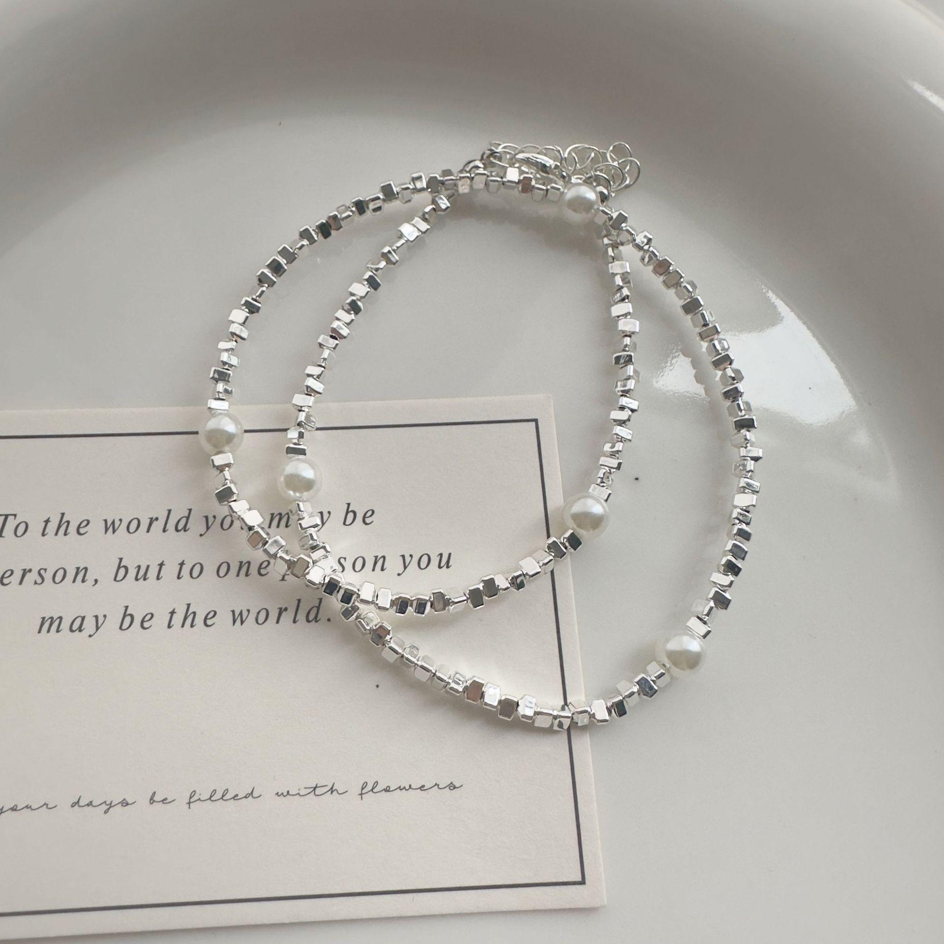 

2024 Новое женское серебряное ожерелье из искусственного жемчуга - Французский нишевый дизайн, легкая роскошь, чокер, цепочка для ключицы