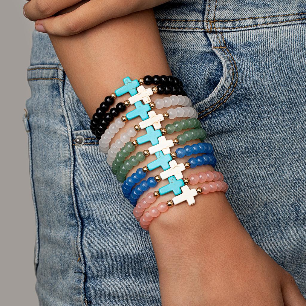 Bohemian style cross colored bead bracelet with multiple pieces of stacked women's bracelet set