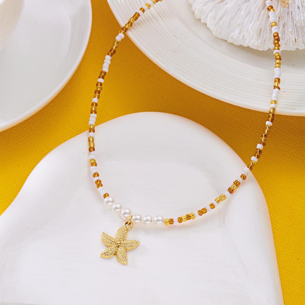 Naszyjnik z koralików seed w kształcie rozgwiazdy: Bohemski choker z pereł