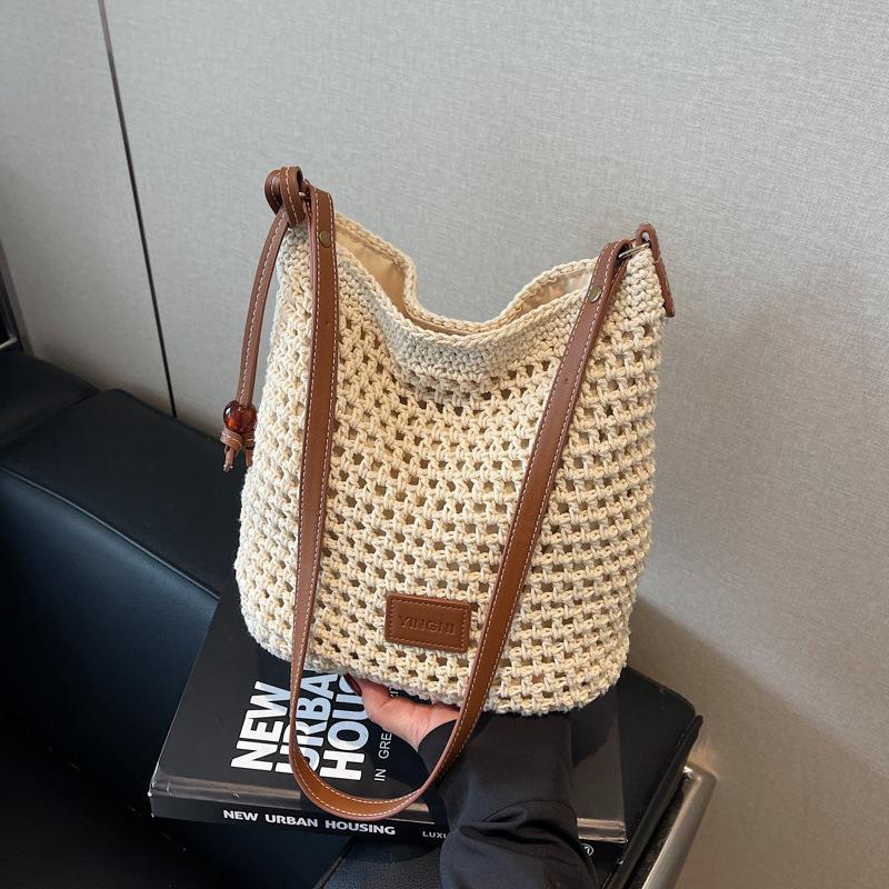 

Праздничная вязаная сумка женская 2025 лето новая повседневная на плечо сумка-мессенджер ажурная плетеная сумка-ведро 22*12*24 бежевый