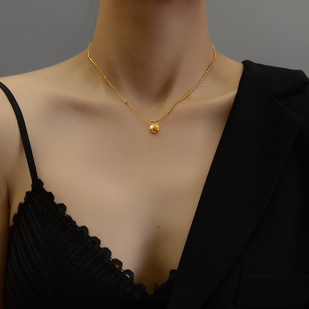 Niche Design Lucky Gold Bean Necklace with Round Bead Chain: European, American, and Korean Style with a Light Luxury Feel.