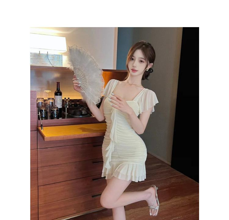 Sexy Hip-Hugging Mesh Splice Fringe Dress – Slim-Fit, Low-Cut Fashion for Bold Style
