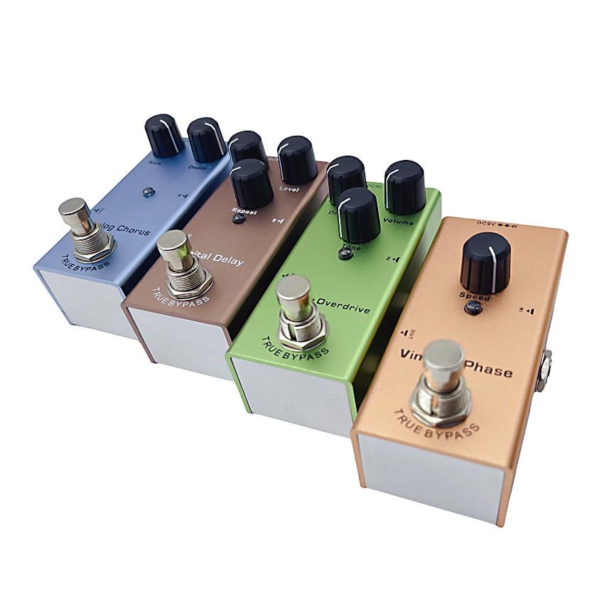 Compact Professional Electric Guitar Effects Pedal with 10 Effects: Distortion, Delay, Chorus, Vibrato, and Sound Simulator.