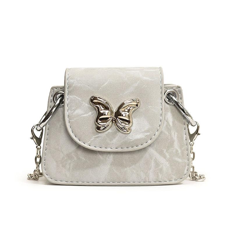 Fashionable Pu Leather Kids Shoulder Bag With Eye-catching Chain Strap Design серебряный
