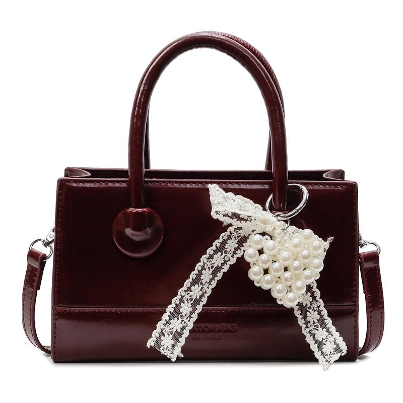 Wholesale Popular Niche Simple Temperament High Sense Portable Small Square Bag Women's Fashion Versatile Work Commuter Messenger Bag