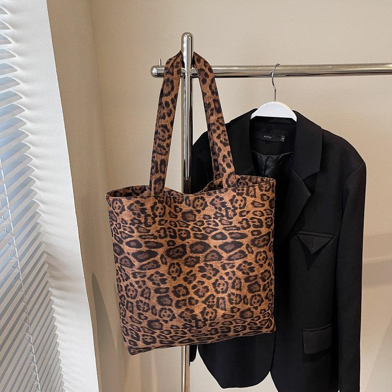 

Leopard print canvas commuting lazy wind bag women 2025 casual fashion portable large capacity shoulder simple bag crossbody
