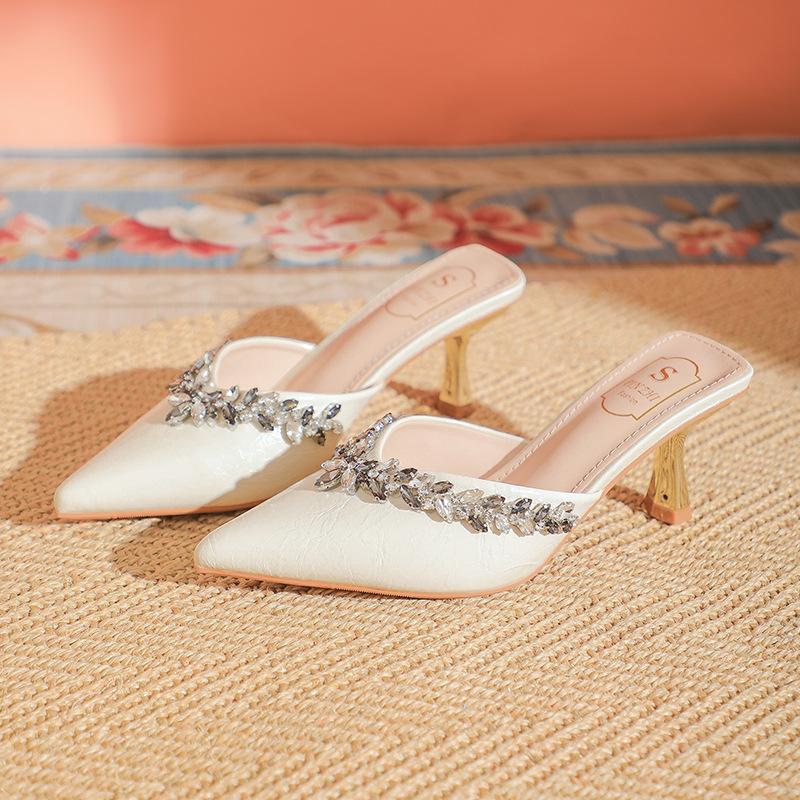 

Beautiful sandals to wear outside spring and summer new pointed rhinestone temperament stiletto high heels bag head half slippers women 43