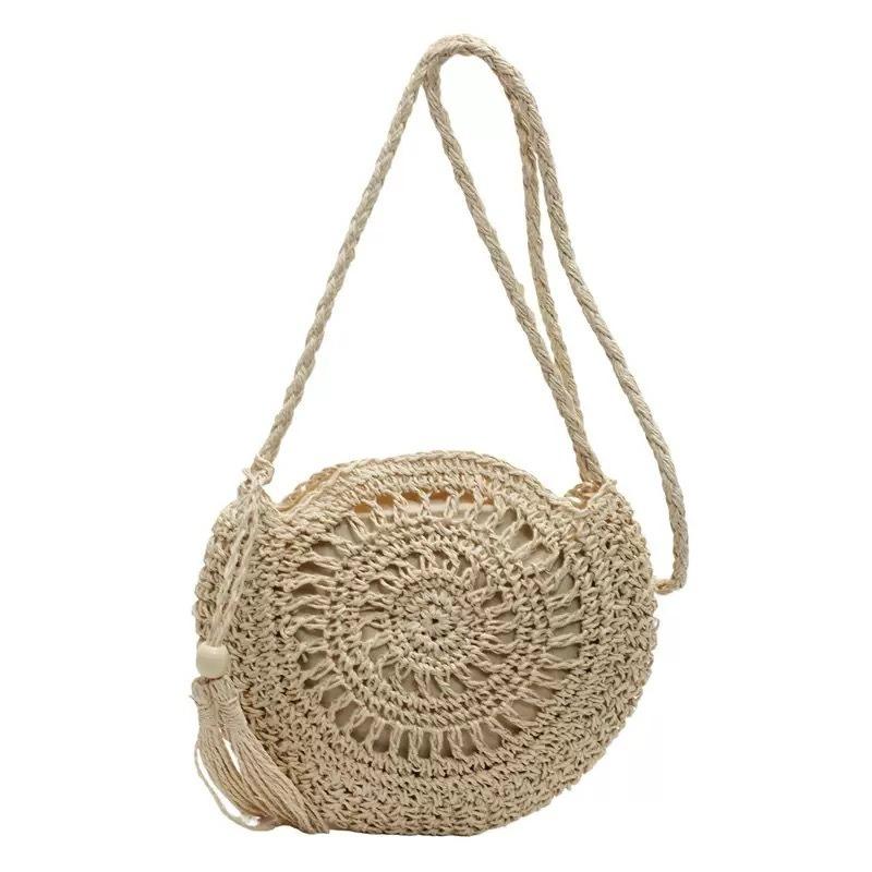 New versatile tassel straw bag shoulder messenger bag handmade hollow woven bag women's bag seaside vacation beach bag