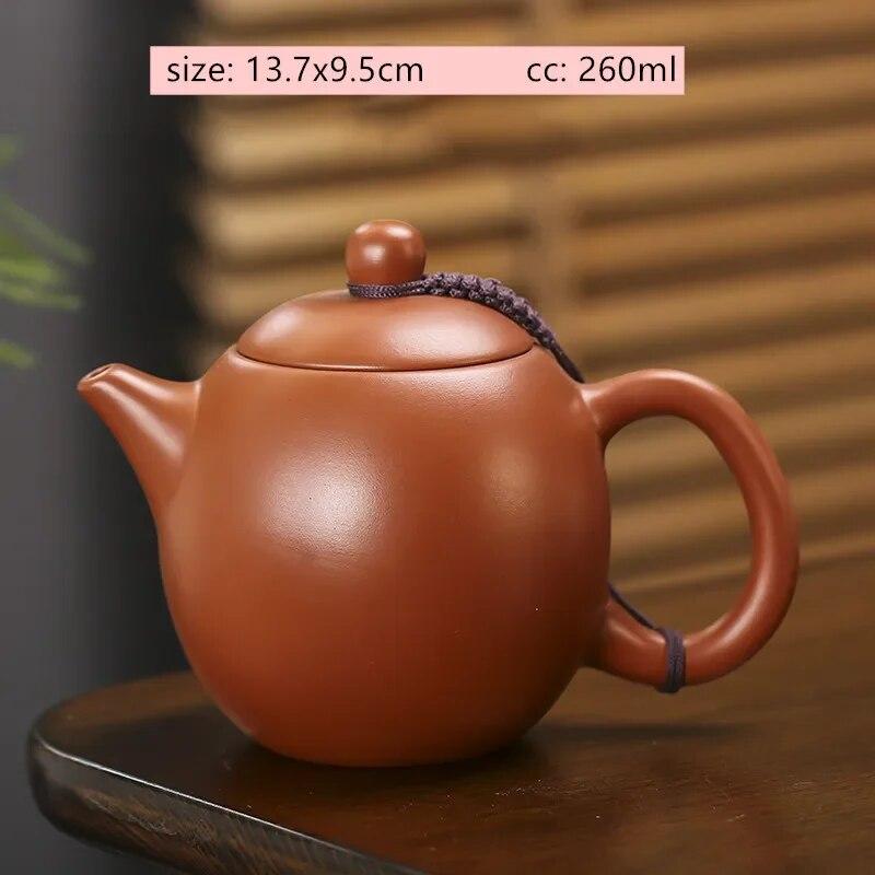 Starožitná fialová hliněná čajová konvička Surová ruda Zhu Mud Konvička Xishi Ručně vyráběná kulová dírka Filtr Beauty Pot Tradiční čajové sady Zisha
