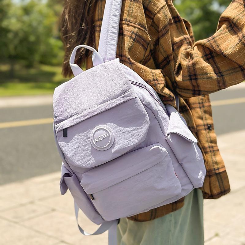 New Japanese outdoor lightweight fashion schoolbag backpack small backpack women's simple and versatile new travel schoolbag women