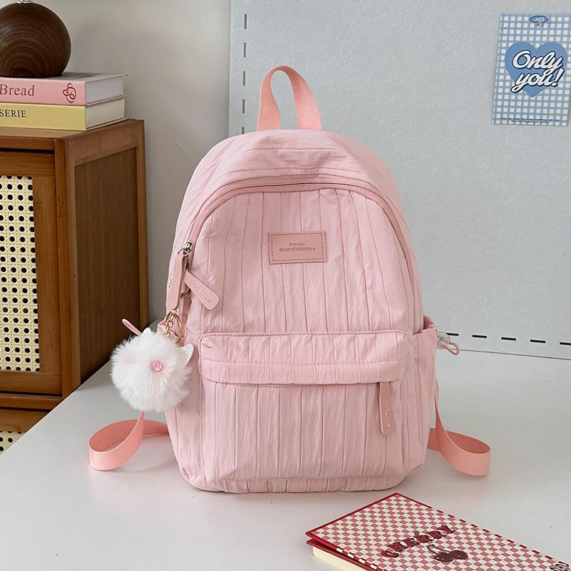 School bag junior high school girls large capacity solid color light primary school backpack high value girl versatile backpack