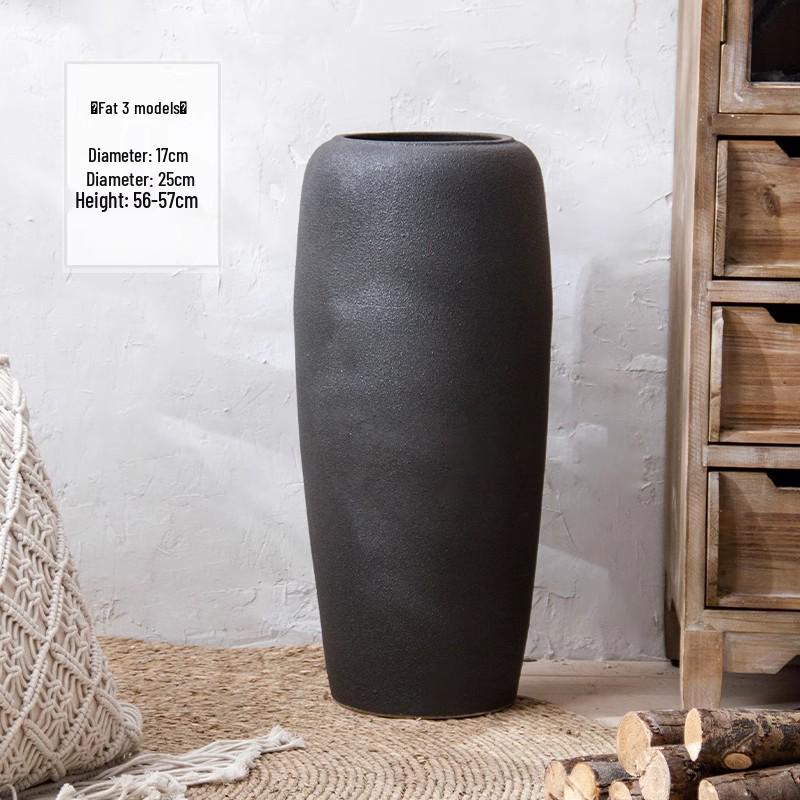 Jingdezhen Black Coarse Pottery Floor Vase: Modern Minimalist Japanese Decor for Hotel, Homestay, or Living Room.