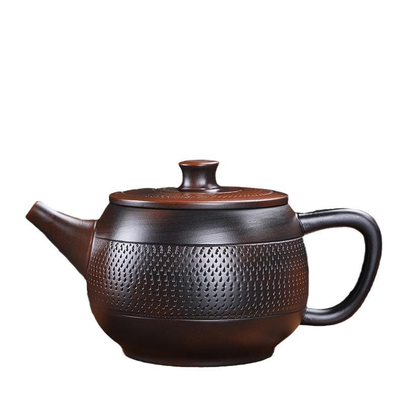 Purple pottery handmade teapot large-capacity ceramic relief pot Kung Fu tea set household purple clay pot ball hole filter