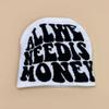 New European and American popular alphabet flame spider skull knitted hat men and women autumn and winter personality hip hop warm