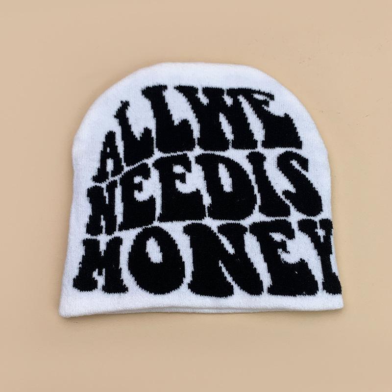 New European and American popular alphabet flame spider skull knitted hat men and women autumn and winter personality hip hop warm