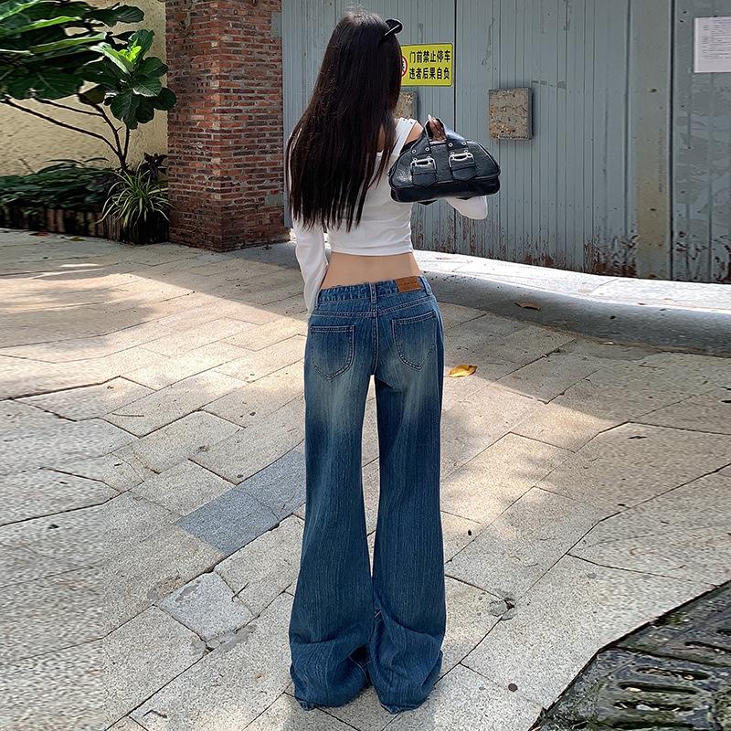 Design sense retro micro-pull jeans women's year autumn and winter new low-rise loose wide-leg thin flared pants