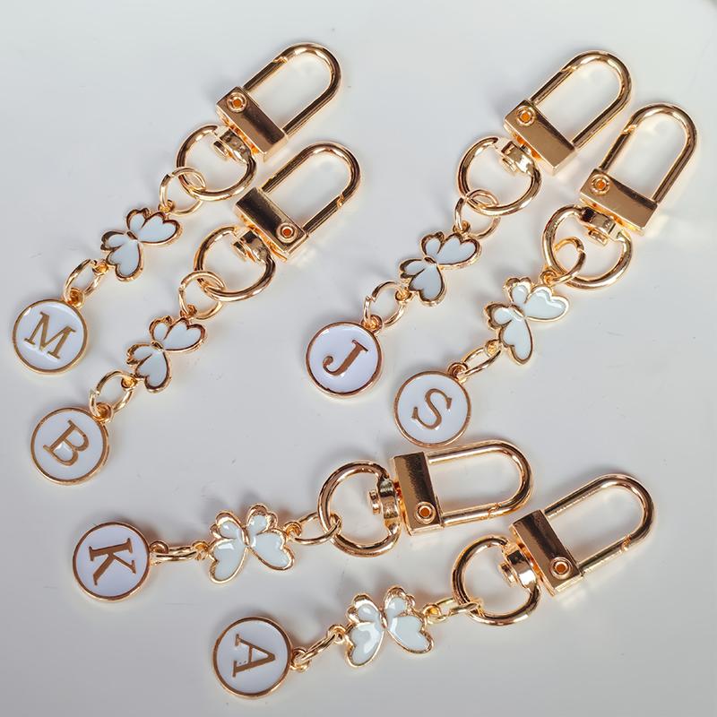 1 Stück Schlüssel-Logo Leichter Schlüsselanhänger Autoschlüssel Begleiter Taschenanhänger Langlebigkeit Metallschlüsselanhänger Monogramm-Anhänger Schmetterling Monogramm-Schlüsselanhänger