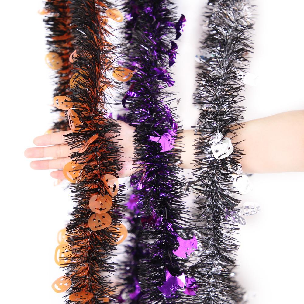 Party Festive Halloween Decorations With Colorful Hanging Streamers Of Pumpkins Bats And Skulls For A Creepy Vibe
