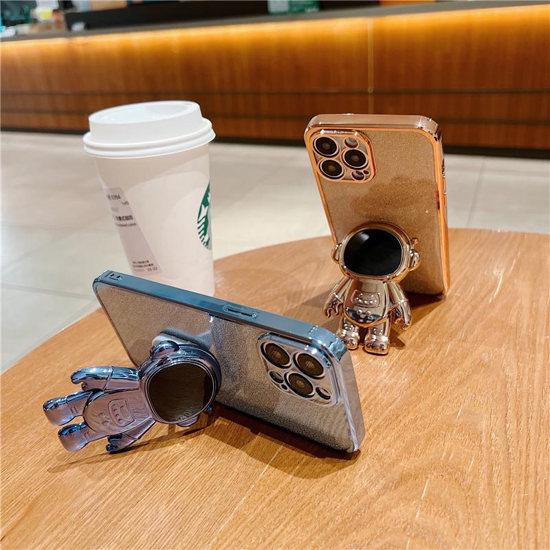 Fashion Glitter Astronaut Foot Stand Phone Case For iPhone 16 15 14 13 11 Pro XR Xs Max 12 Mini Plating Holder Cover On 7 8 Plus