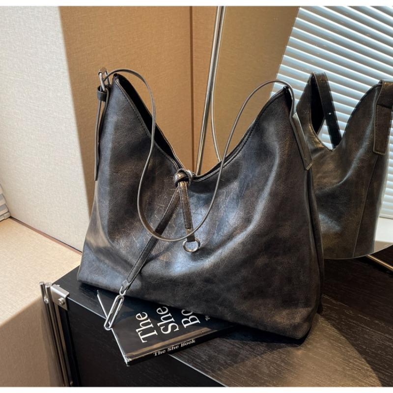 Retro high-end sense fashion large-capacity bag women's new versatile wasteland wind tote bag shoulder bag