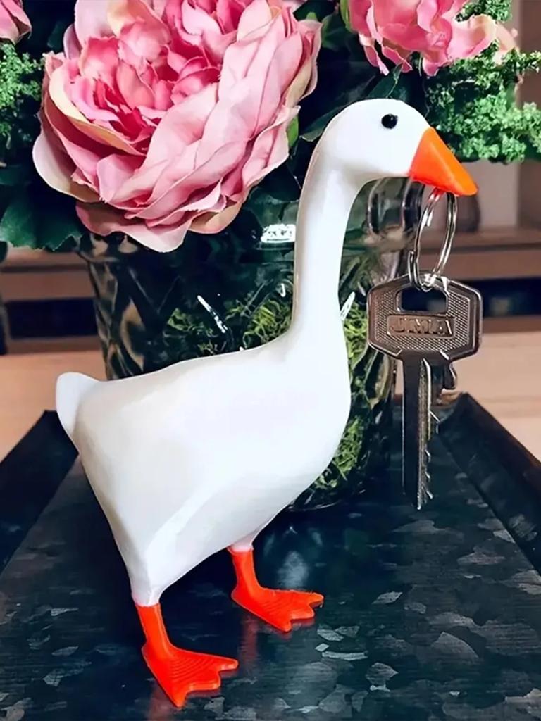 1pc, Magnetic Goose Key é uma escultura de decoração de casa de corrente, decoração de mesa de escritório, escultura de pato de ganso de resina, porta-ferramentas para casa