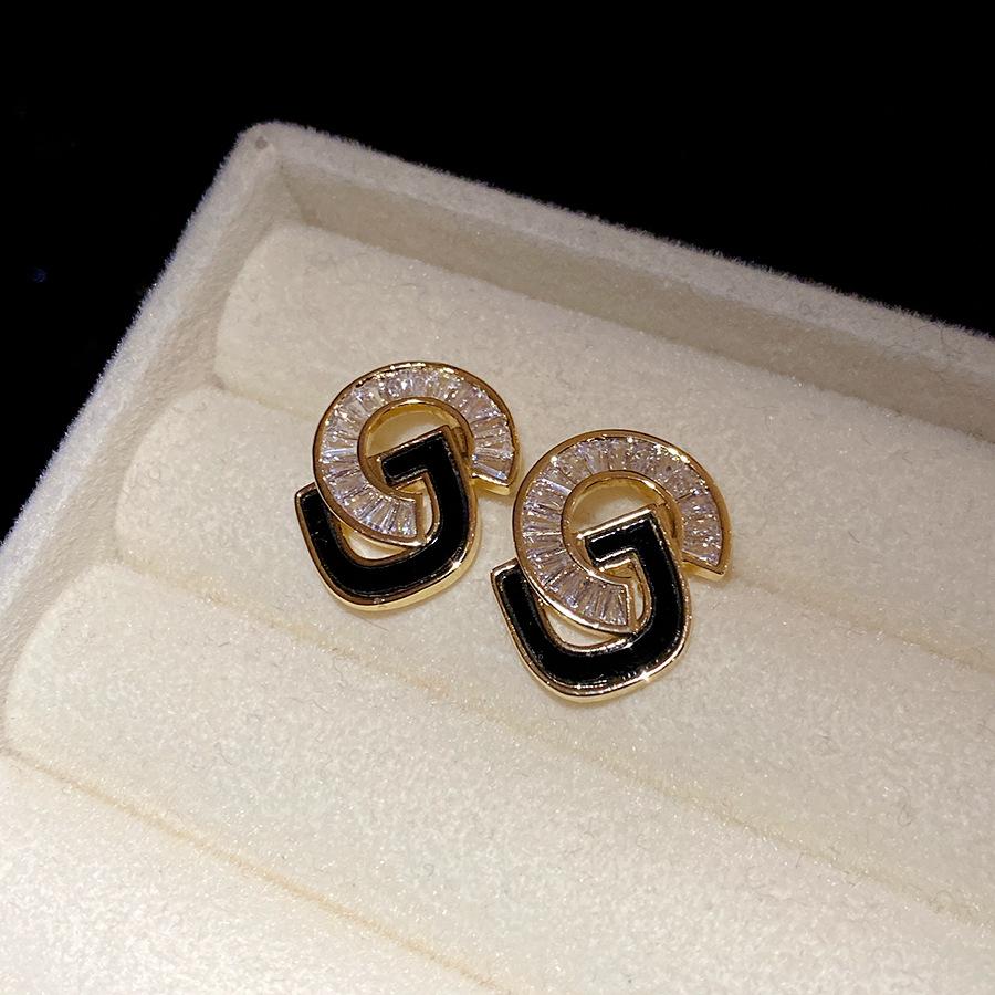 

K real gold electroplated silver needle zircon CD stud earrings retro personality exquisite fashion earrings light luxury high-end earrings
