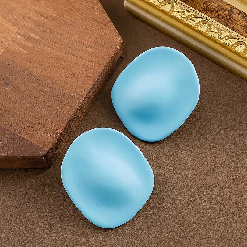 

Korean version of sweet temperament holiday style irregular geometric paint stud earrings niche design high-end earrings women