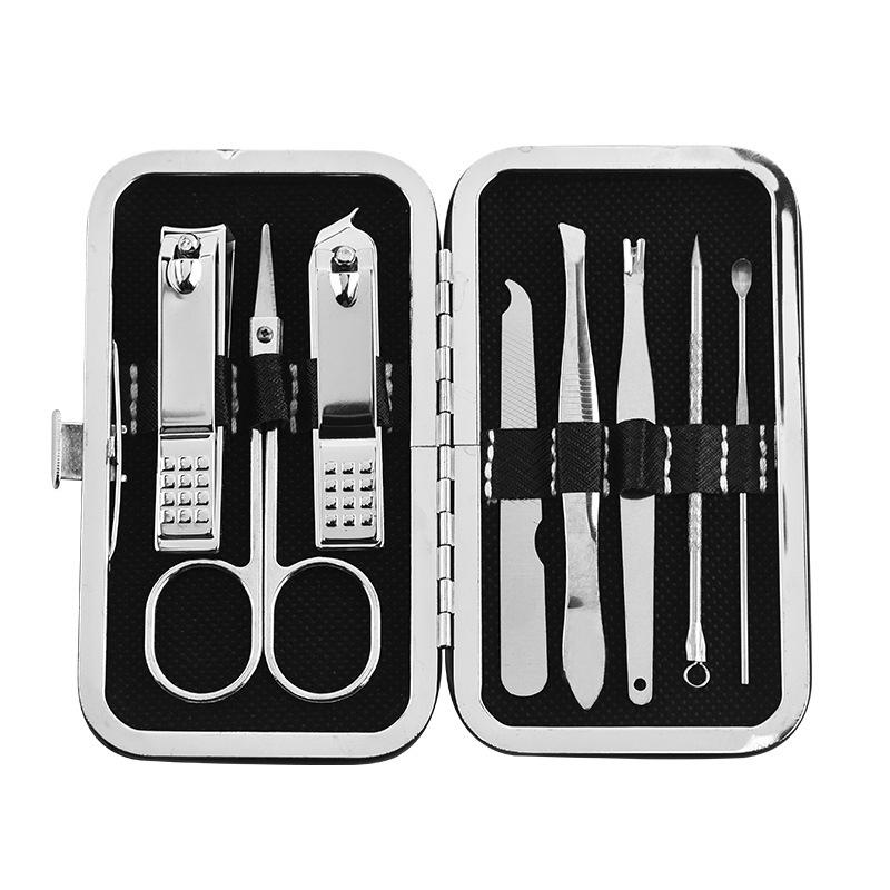 

Набор для маникюра и педикюра из 8 предметов из нержавеющей стали: Кусачки для ногтей, ножницы со скошенным краем, пилочка и другое чёрный