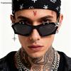 Trendy punk-style black sunglasses, unisex, with a unique cat-eye design, embellished with rhinestones, rivets, and a metal starburst pendant