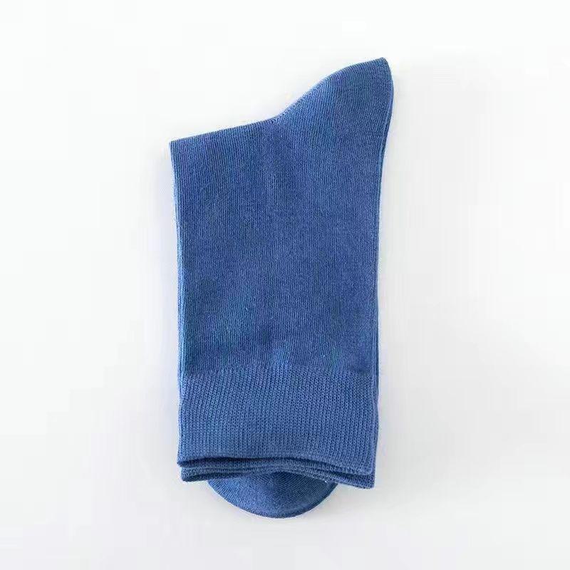 Men's Versatile Black Mid-Tube Socks - Solid Color, Deodorant, Sweat-Absorbent, Ideal for Spring, Autumn, and Summer.