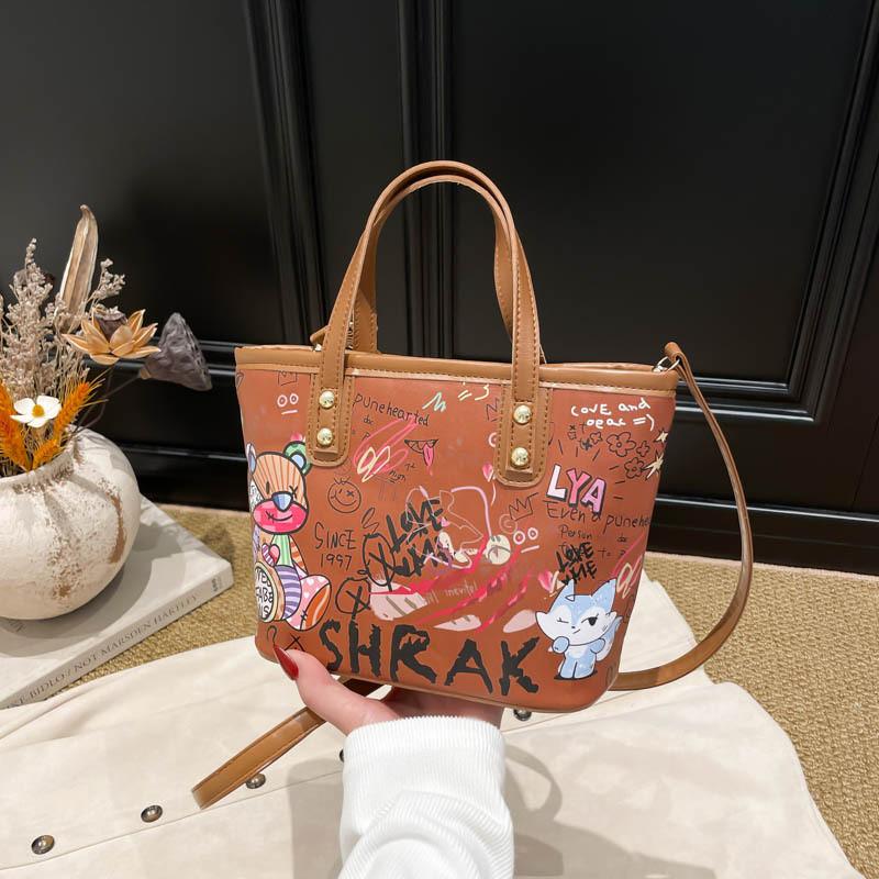 

Pu Large Capacity Bucket Bag For Women With Cartoon Graffiti Design Casual Street Style коричневий