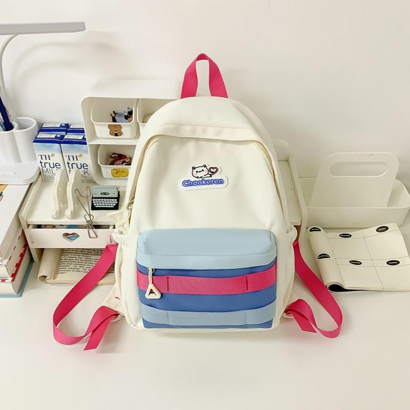 New Small Fresh Contrast Bag Light and Casual Outdoor Backpack High capacity Backpack for Junior and Senior High School Students.