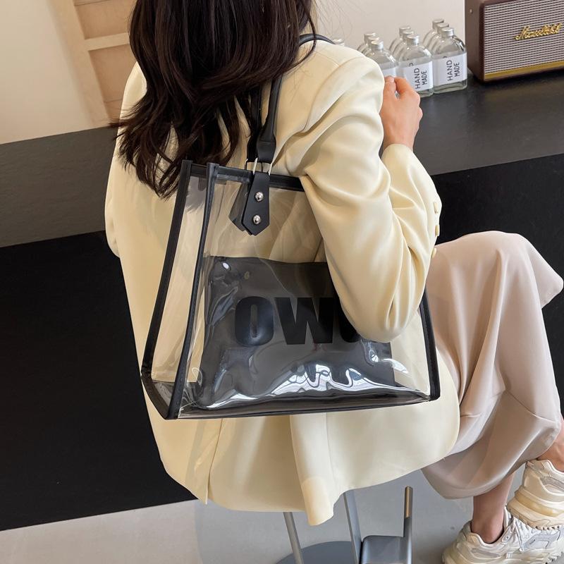 Transparente Jelly-Tasche Damen große Kapazität 2025 neue Sommer personalisierte Umhängetasche Textur Kind und Mutter Pendler Tragetasche
