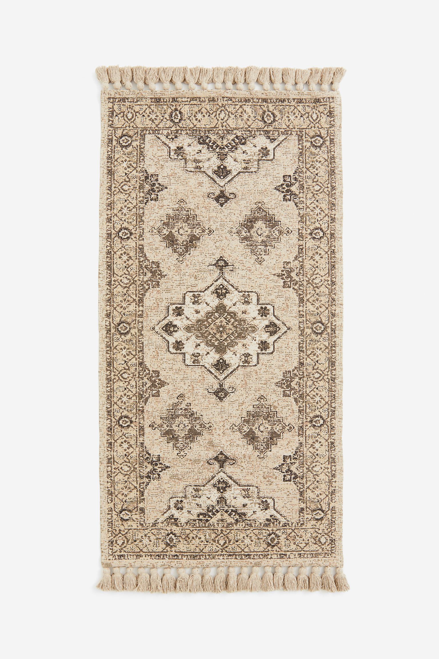 

Fringed patterned rug
