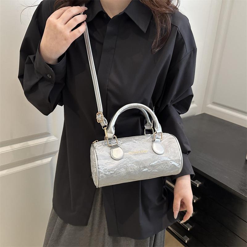 Niche design cylinder handbag new temperament versatile high sense messenger bag fresh and sweet shoulder bag