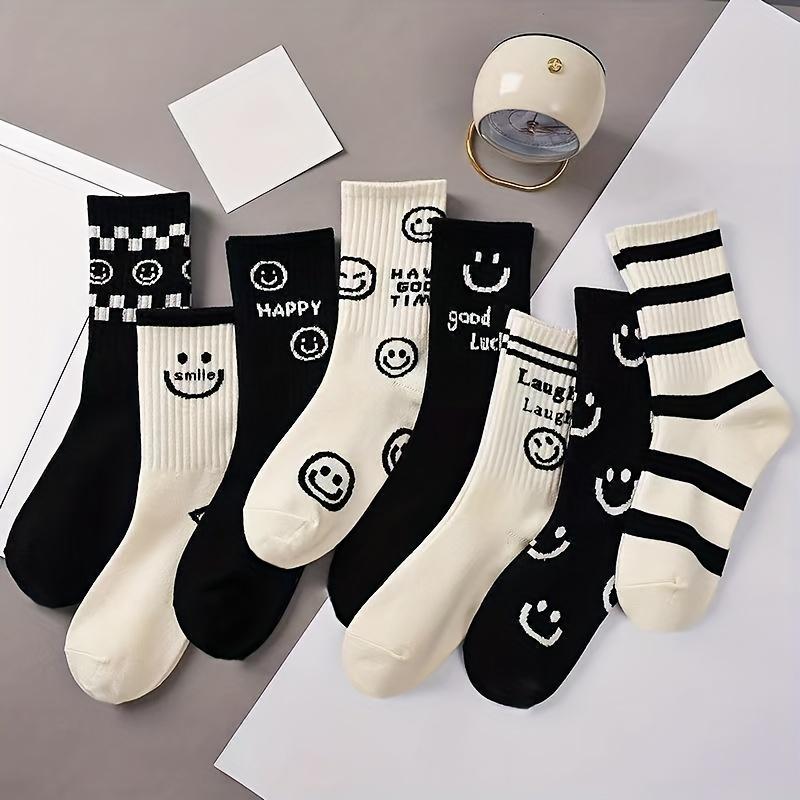 

5 pairs of women s black and white color cartoon smiley face versatile casual long tube striped sports socks One Size