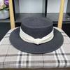 Light luxury Internet celebrity French small straw woven flat top flat brim straw hat women's summer travel simple sun protection holiday visor