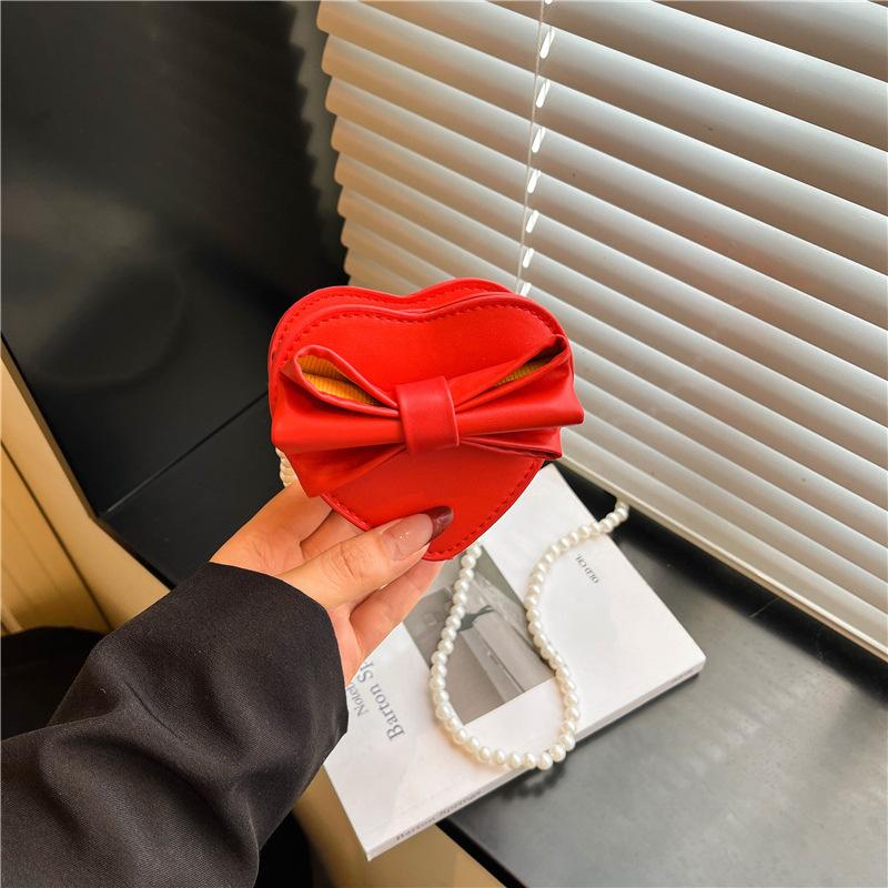 Summer new Korean version heart-shaped bow women's bag small bag foreign style shoulder bag solid color small bag messenger bag women