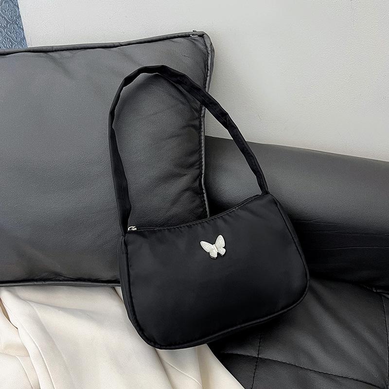 

Простая женская сумка подмышку 2025 новая нейлоновая ткань водонепроницаемая однотонная универсальная сумка через плечо женская сумка чёрный