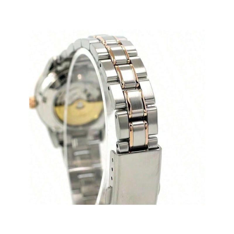 Oriental Automatic Mechanical Watch from featuring dial, mother-of-pearl dial Oriental mother-of-pearl numeral markers/stainless steel GOLD-TONE