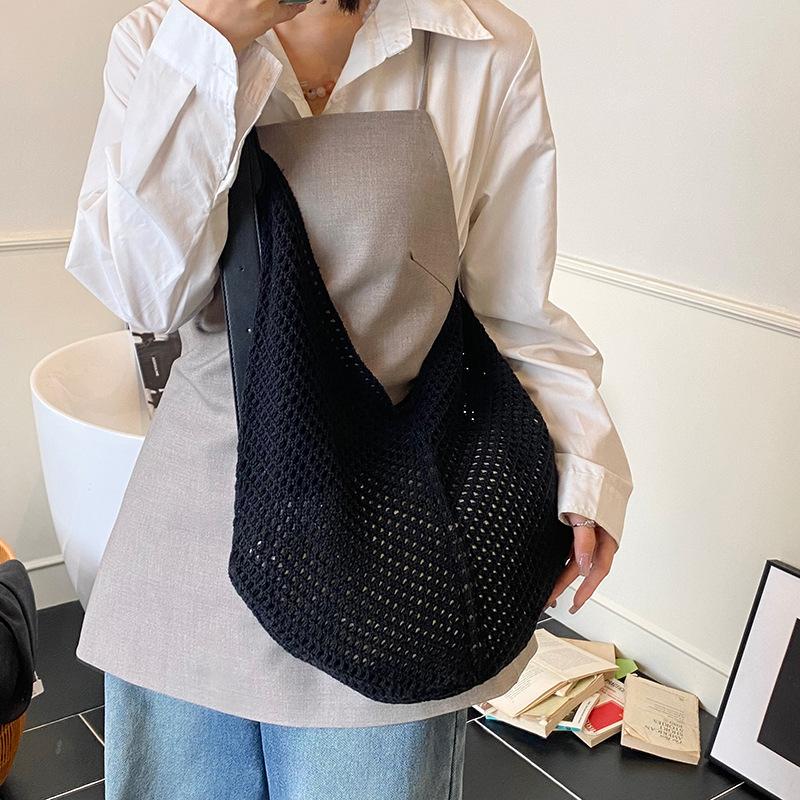 Summer niche fashion versatile woven rope hollow tote design mesh pocket portable child and mother bag shoulder bag