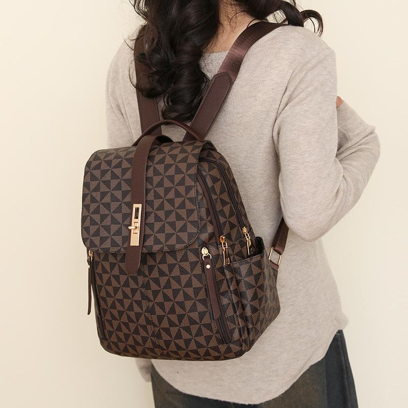 A New Fashionable Backpack for Women with Retro Printed Letters and Large Capacity
