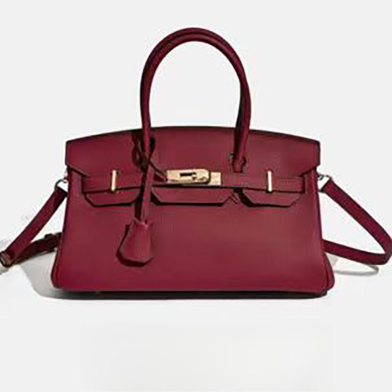 Diese horizontale mehrfarbige Platintasche ist modisch und vielseitig für den Arbeitsweg sowie eine Damen-Umhängetasche.