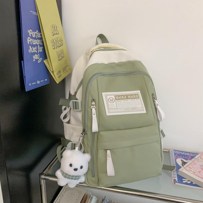 The schoolbag is high-value, fresh and cute, the schoolbag is casual, simple and light, and the commute is versatile and large capacity.