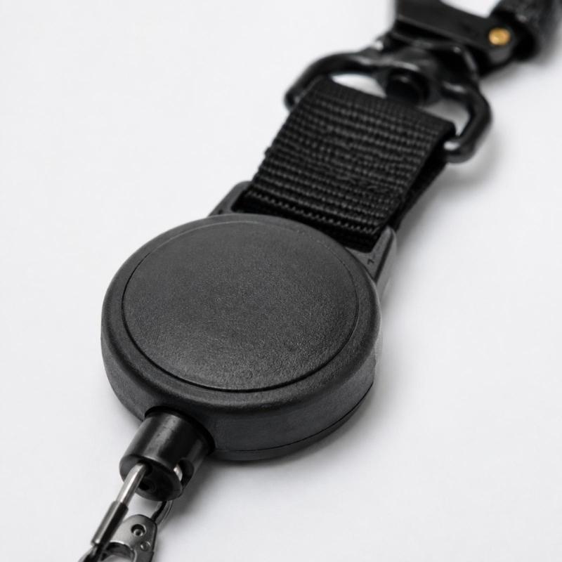 Round Reels Tethers Lanyards for Key and Access Card with a Retracting Cord That Returns the Attaching Item After Each Use