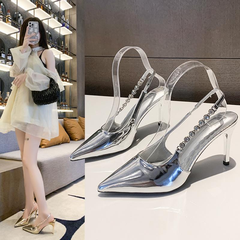 

Summer 2025 new pointed head shallow mouth rhinestone patent leather silver high heels thin heel versatile word with bag head sandals 35