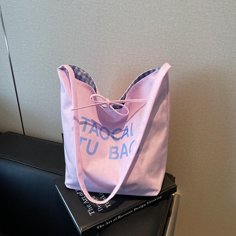 Lazy and lightweight cloth bag, tote bag, niche literary and artistic large-capacity shoulder bag, double-sided usable messenger bag.