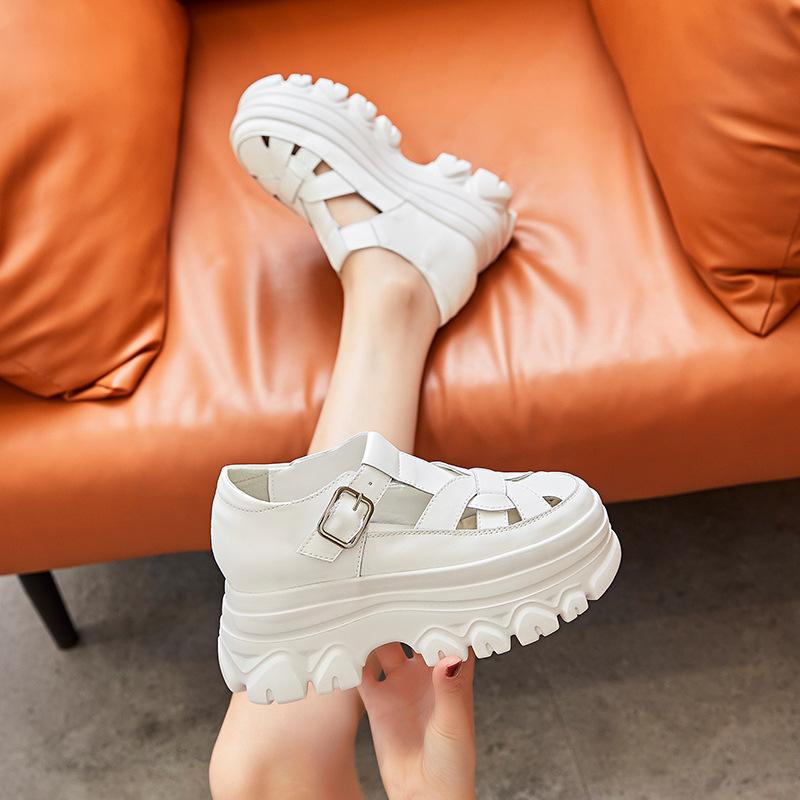 Korean version of thick-soled heightened leather bag head sandals women's 2025 summer new retro hollow muffin high-heeled Roman shoes